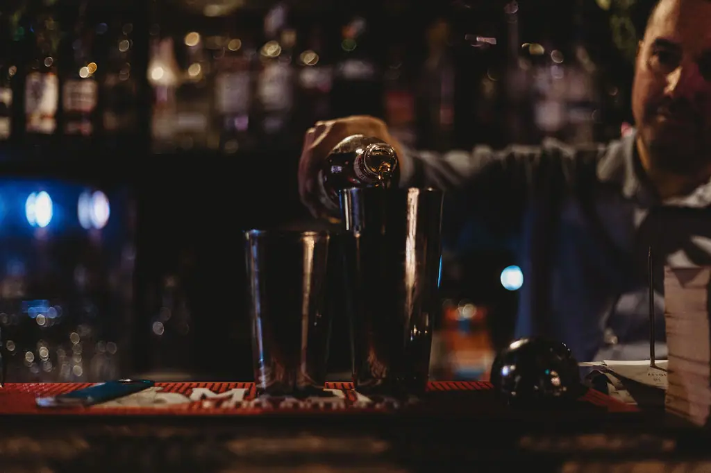 Cocktails being made behind the bar